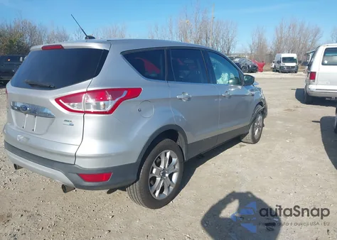 2013 Ford Escape Sel z USA, uszkodzony, nr VIN 1FMCU9HX4DUD40365